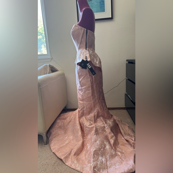 Strapless Peplum Mermaid 
Gown by Cinderella Divine - Picture 8 of 9